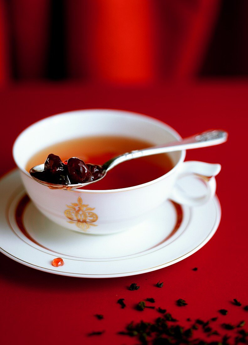 Tea with varen'ye (fruit jam, Russia)