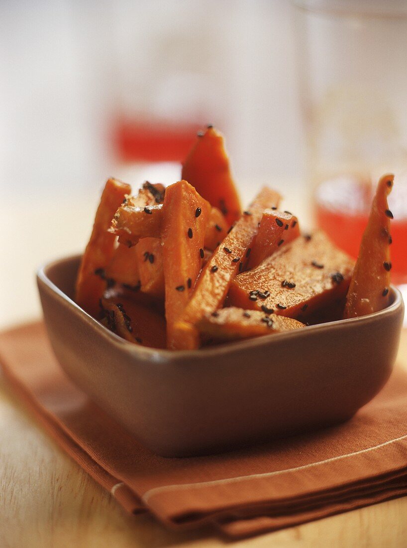 Sweet potatoes with black sesame in a dish