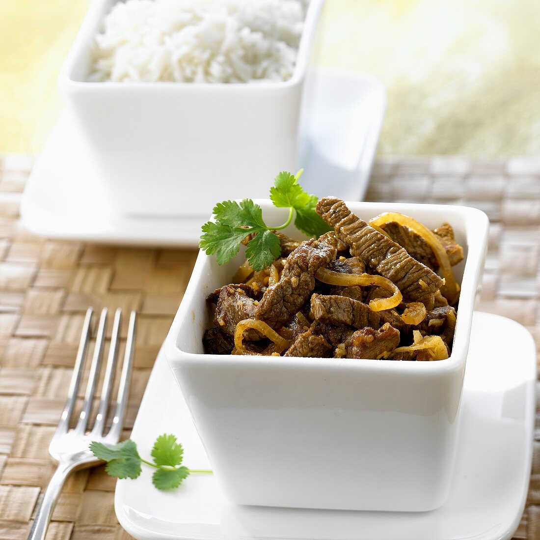 Beef curry with small bowl of basmati rice (Indonesia)