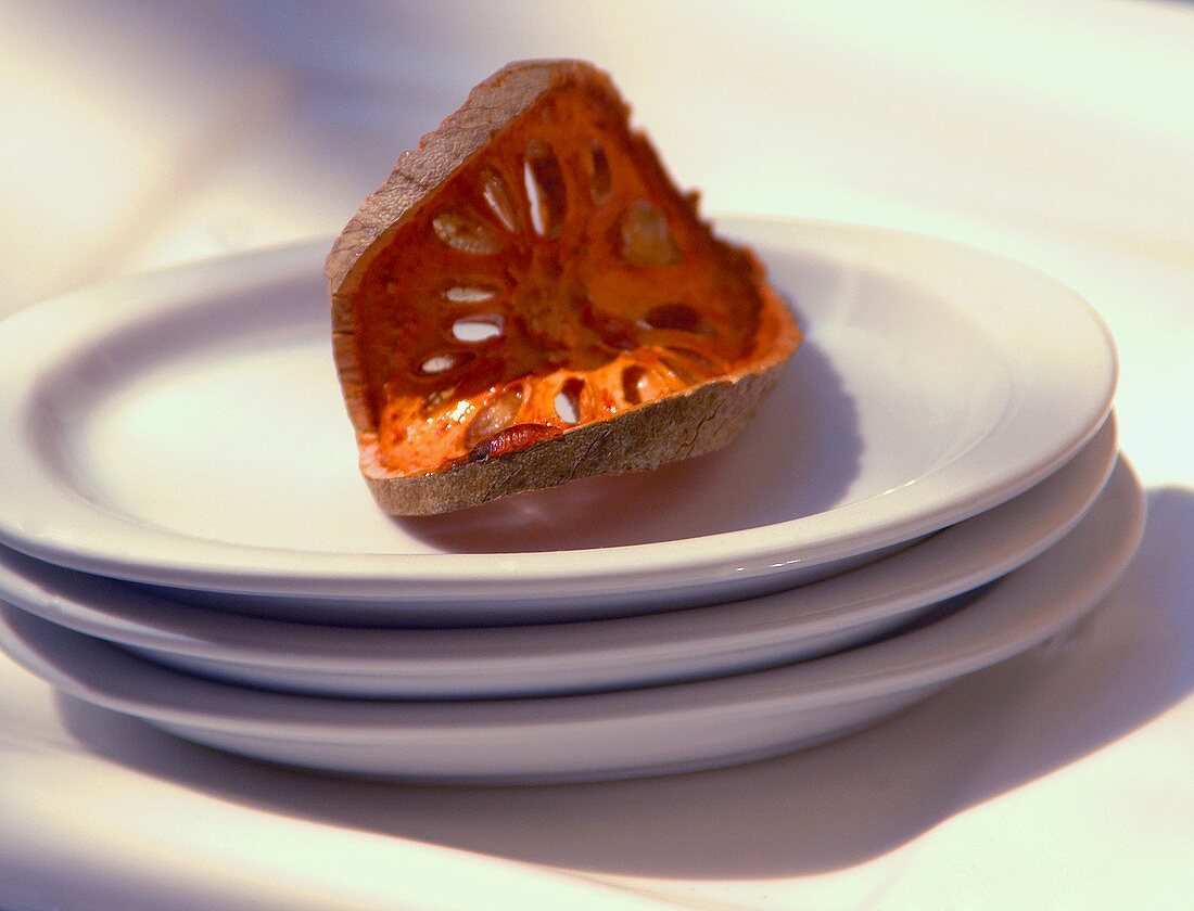 A slice of dried bael fruit
