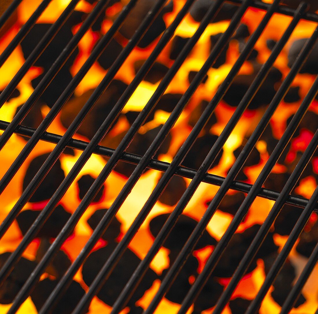 Barbecue rack with glowing charcoal