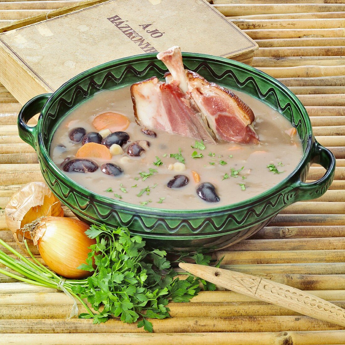 Hungarian bean soup with knuckle of pork