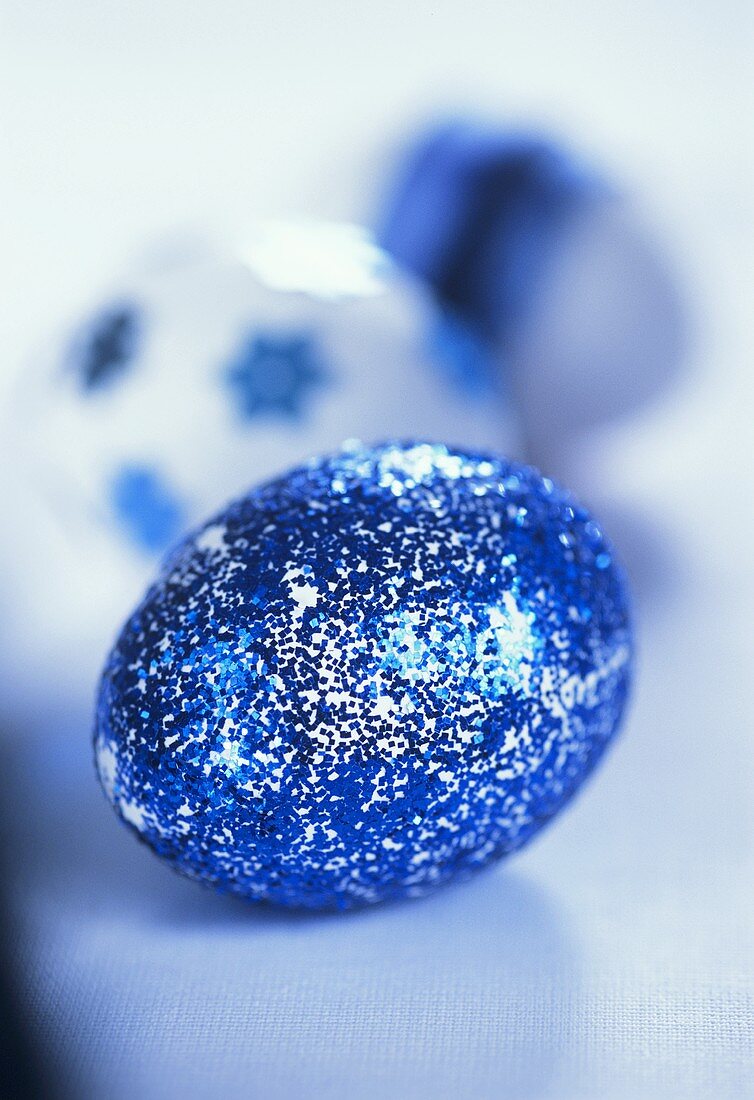 Easter egg with blue spangles