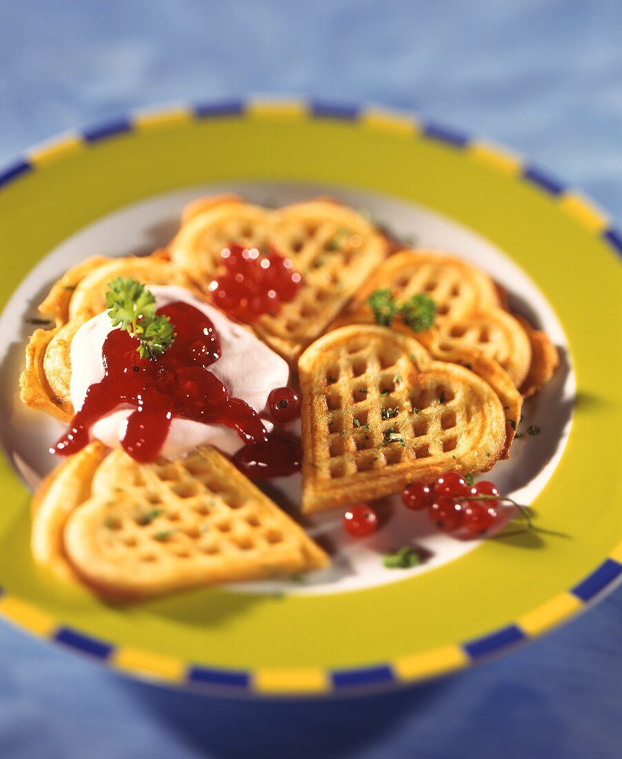 Savoury cheese waffles with redcurrant jelly