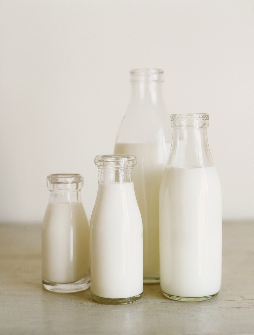 Vier Milchflaschen