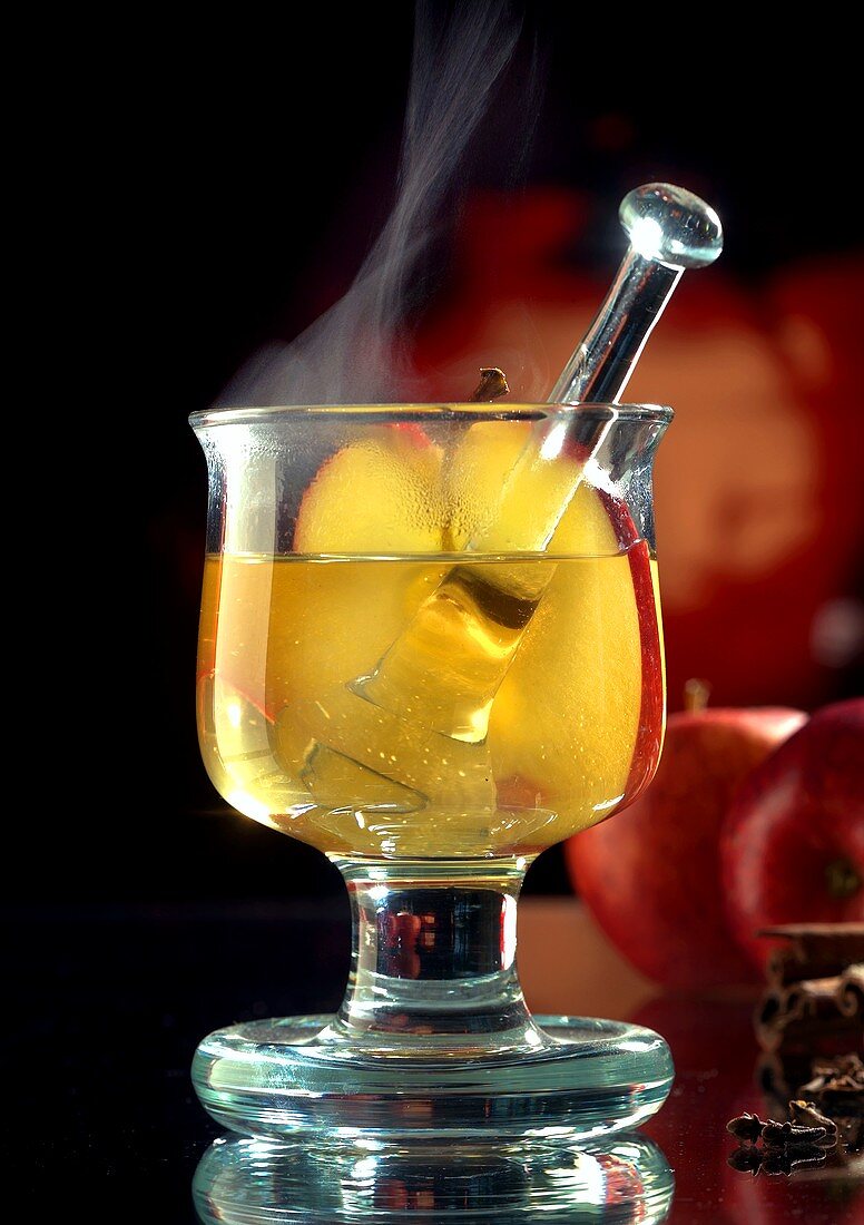 Steaming apple punch in glass