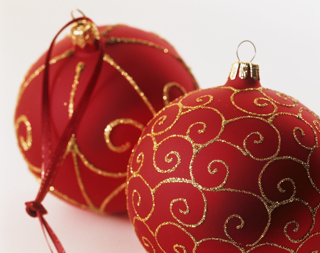 Two red Christmas baubles