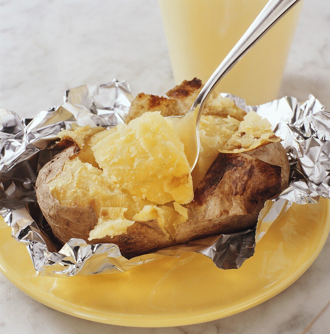 Barbecued baked potatoes