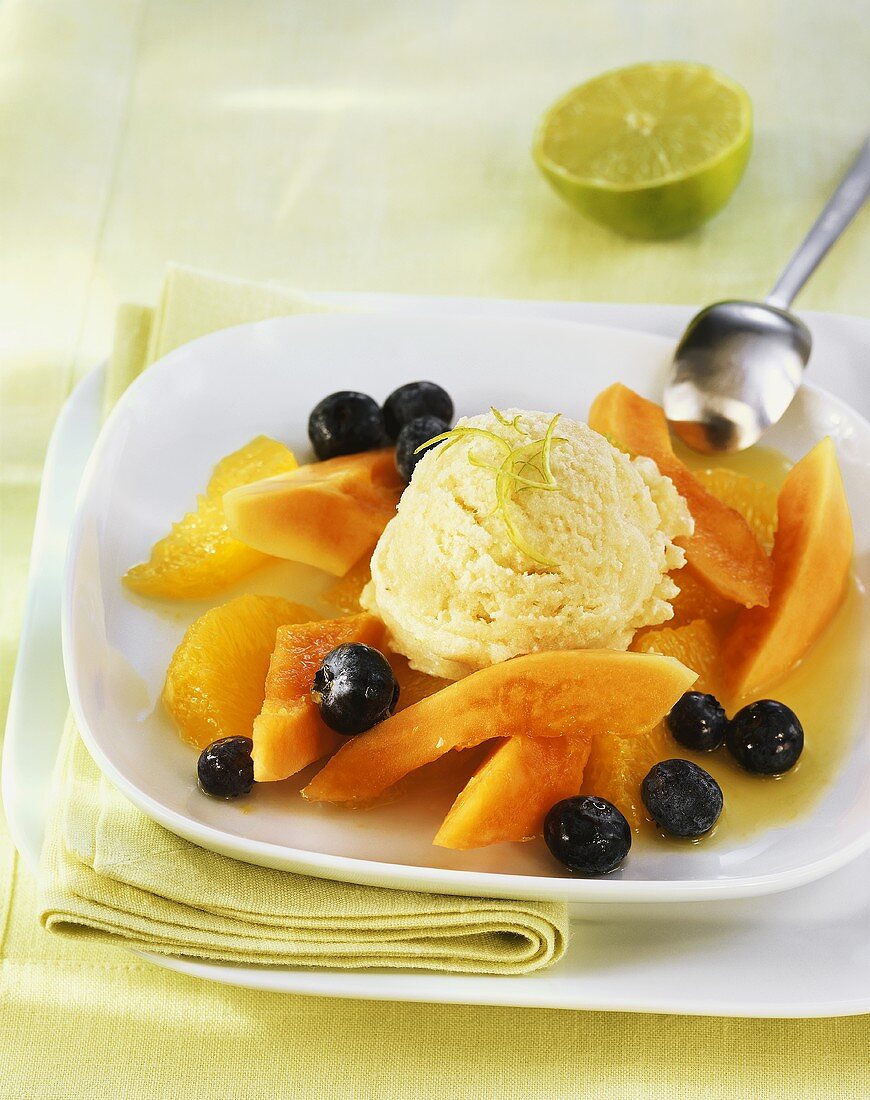 Lime ice cream with fruit salad