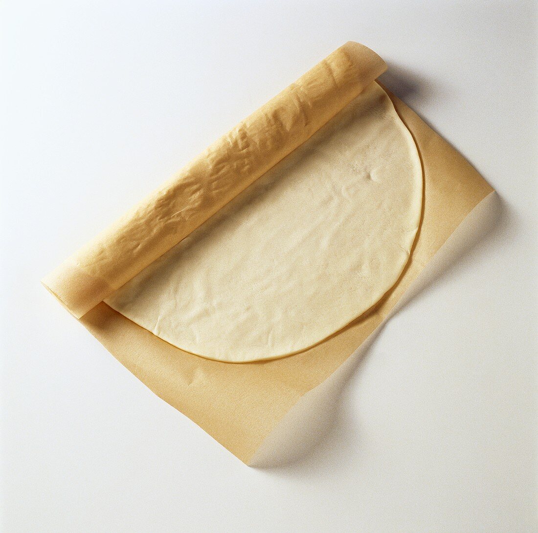 Ready-made pastry in baking parchment