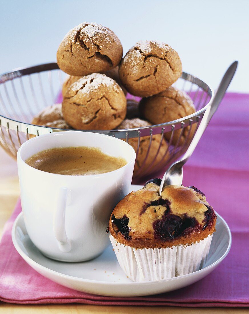 Rye rolls, coffee and blueberry muffin