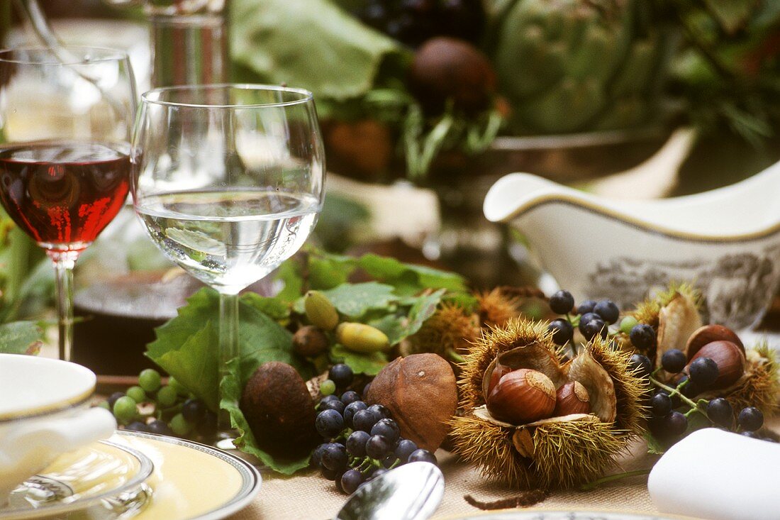 Autumn on the table with chestnuts, mushrooms, acorns..