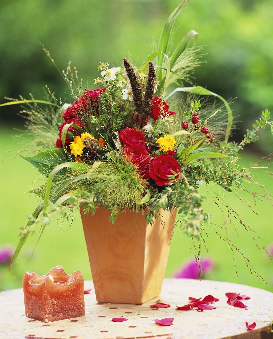 Bouquet of summer flowers with grasses