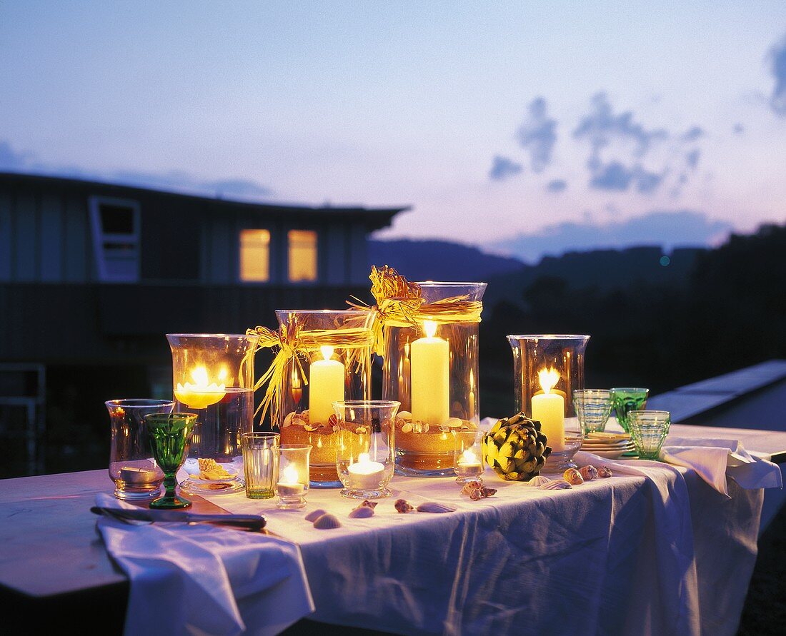 Table with garden lights shining in the twilight