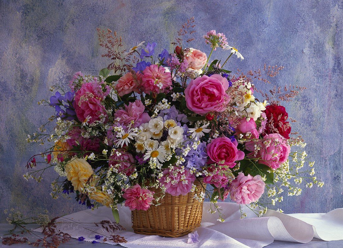 Fragrant summer bouquet of English roses, marguerites etc.