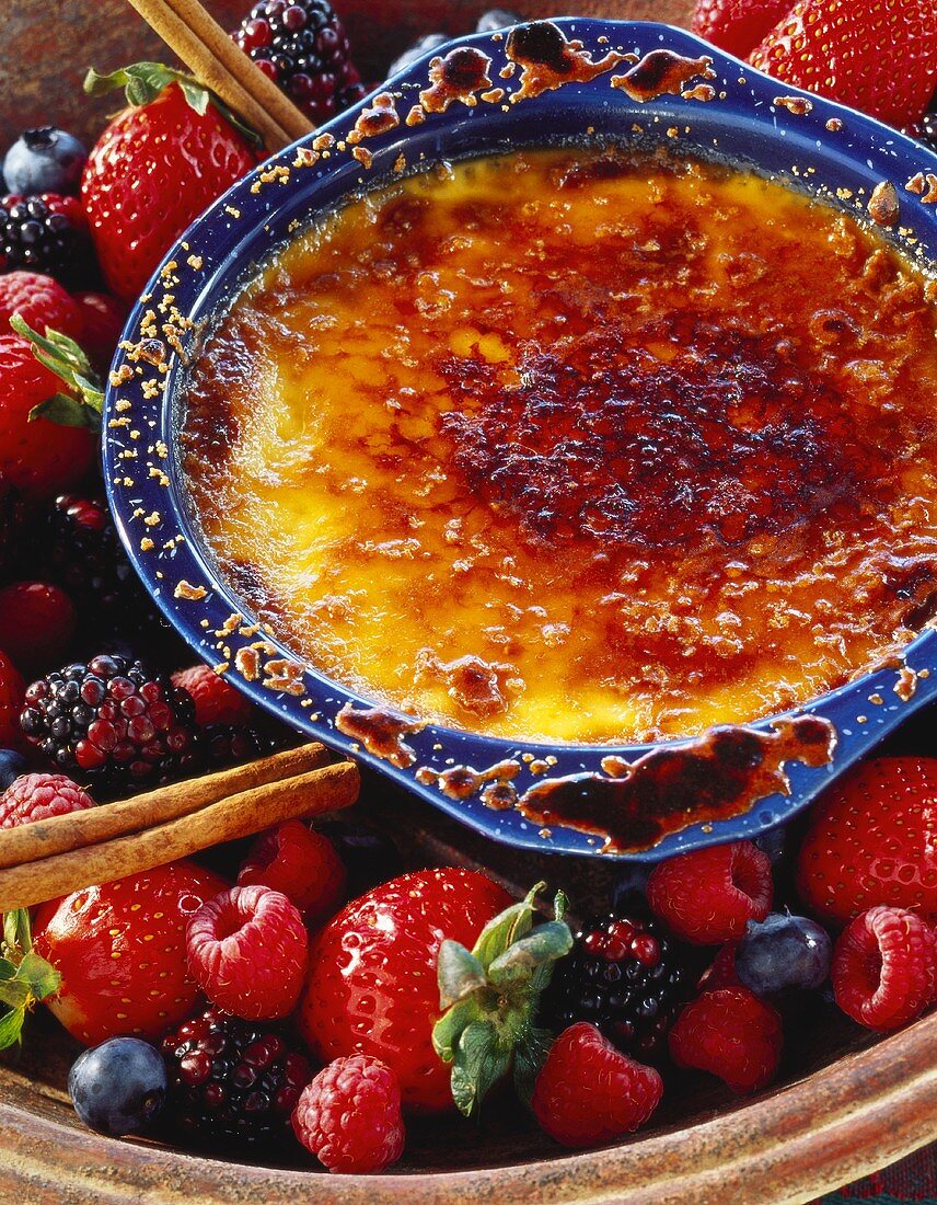 Crème brûlée on fresh mixed berries