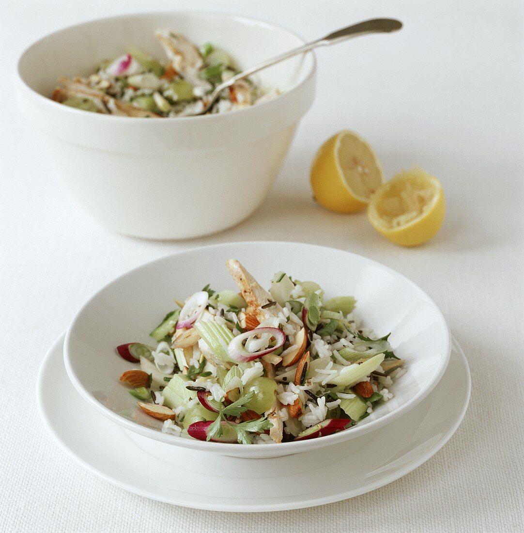 Rice salad with chicken, grapes, almonds and celery