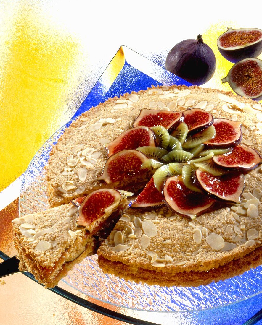 Almond cake with kiwi fruit and figs