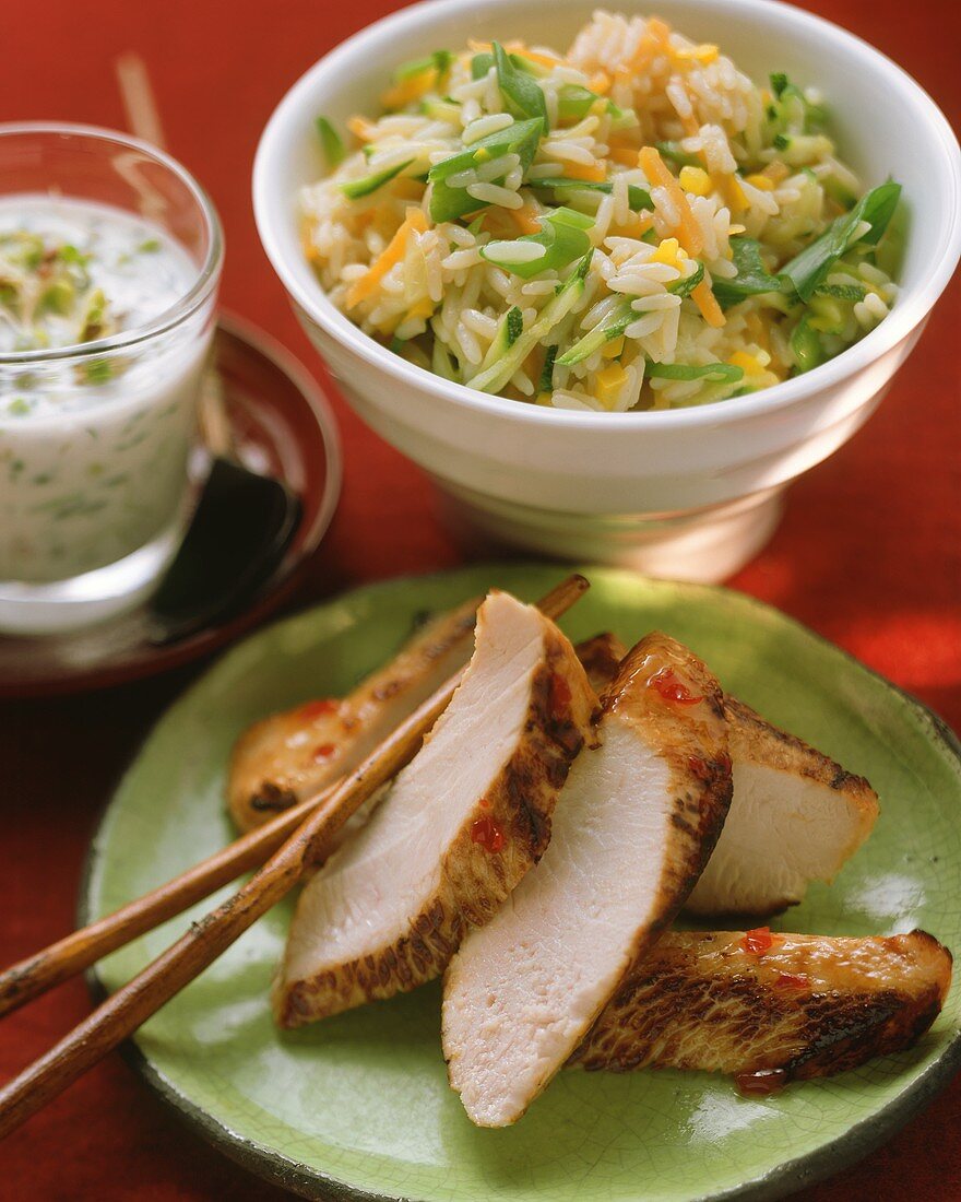 Turkey breast with yoghurt dip and vegetable rice