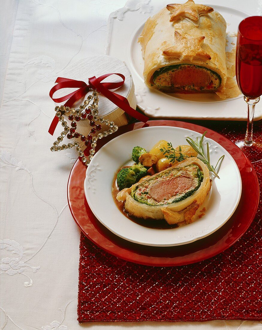 Veal fillet in puff pastry with broccoli and potatoes