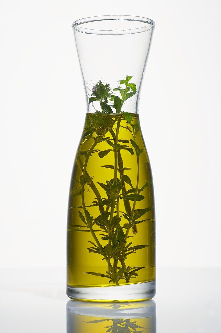 Thyme oil in a carafe