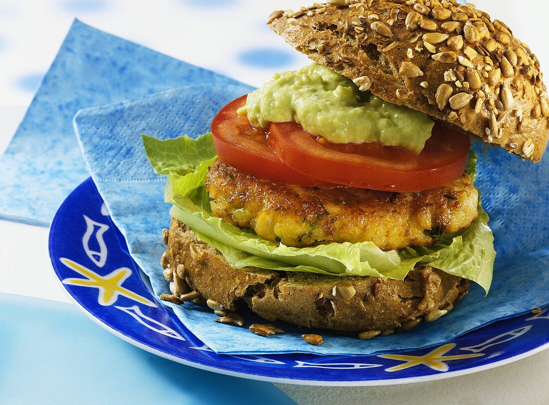 Fish burger with avocado paste