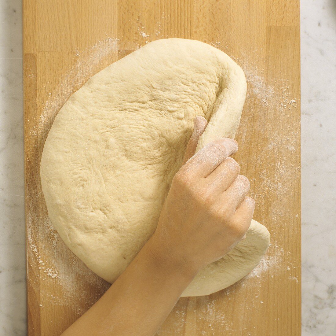 Folding bread dough