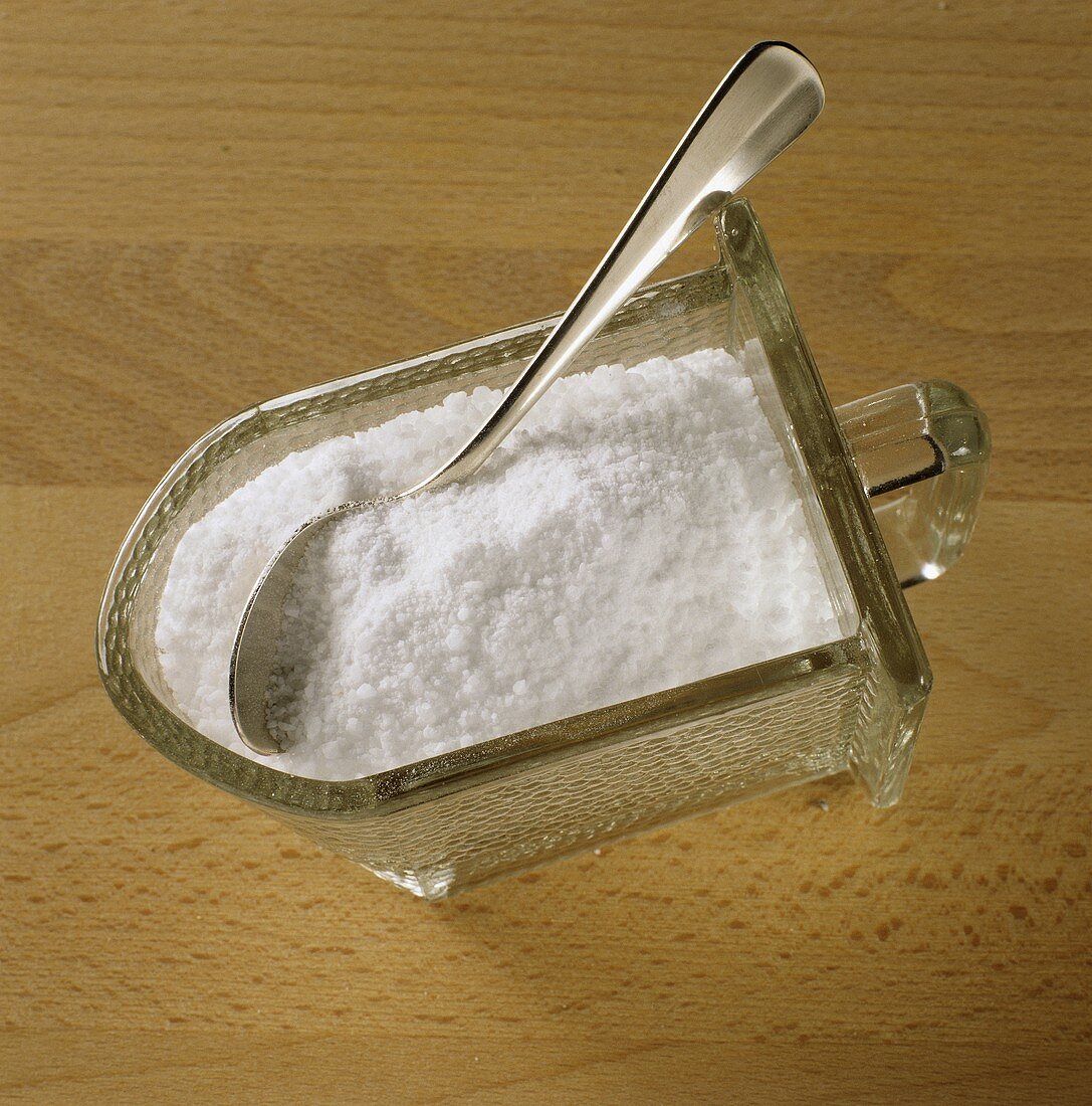Salt in container with spoon