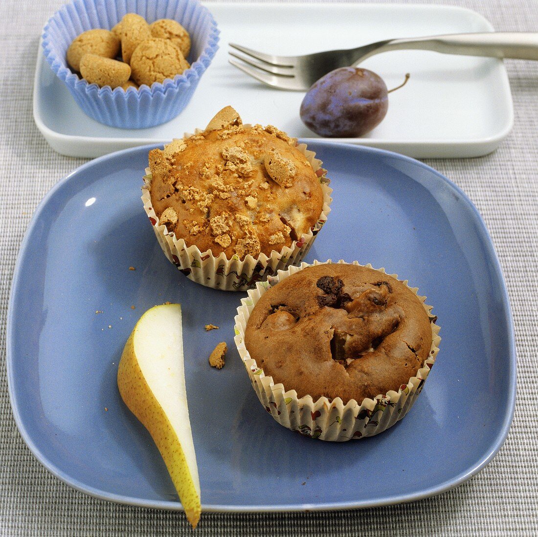 Zwetschgen-Amarettini-Muffin und Nutella-Birnen-Muffin