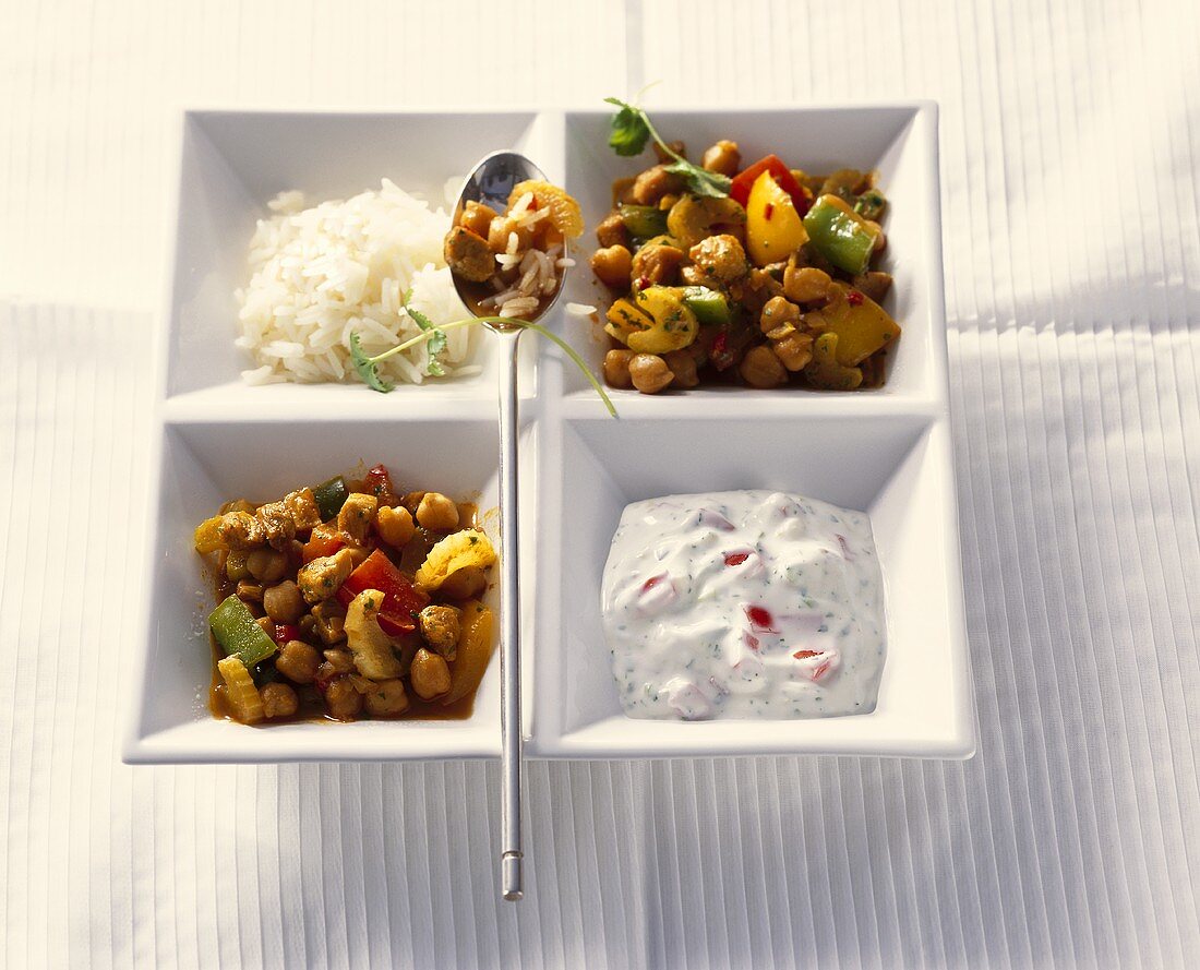 Pork and pepper curry with rice and yoghurt sauce