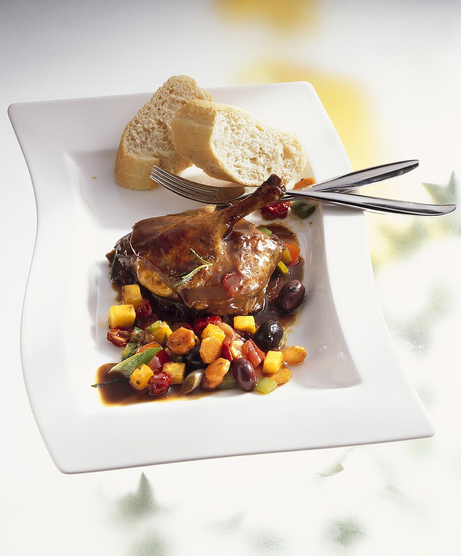 Braised wild duck with vegetables and baguette