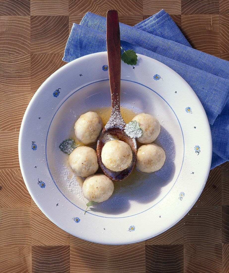 Sirniki (small curd cheese dumplings, Baltic region)