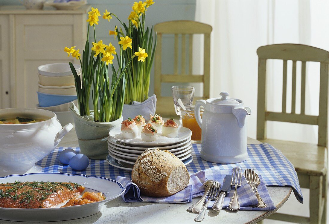 Easter brunch with stuffed eggs, salmon and vegetable soup