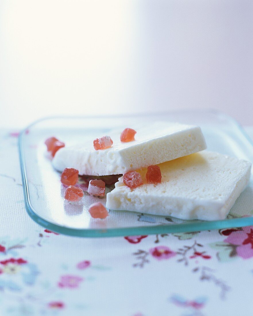 Two slices of rose water parfait with Turkish sweets