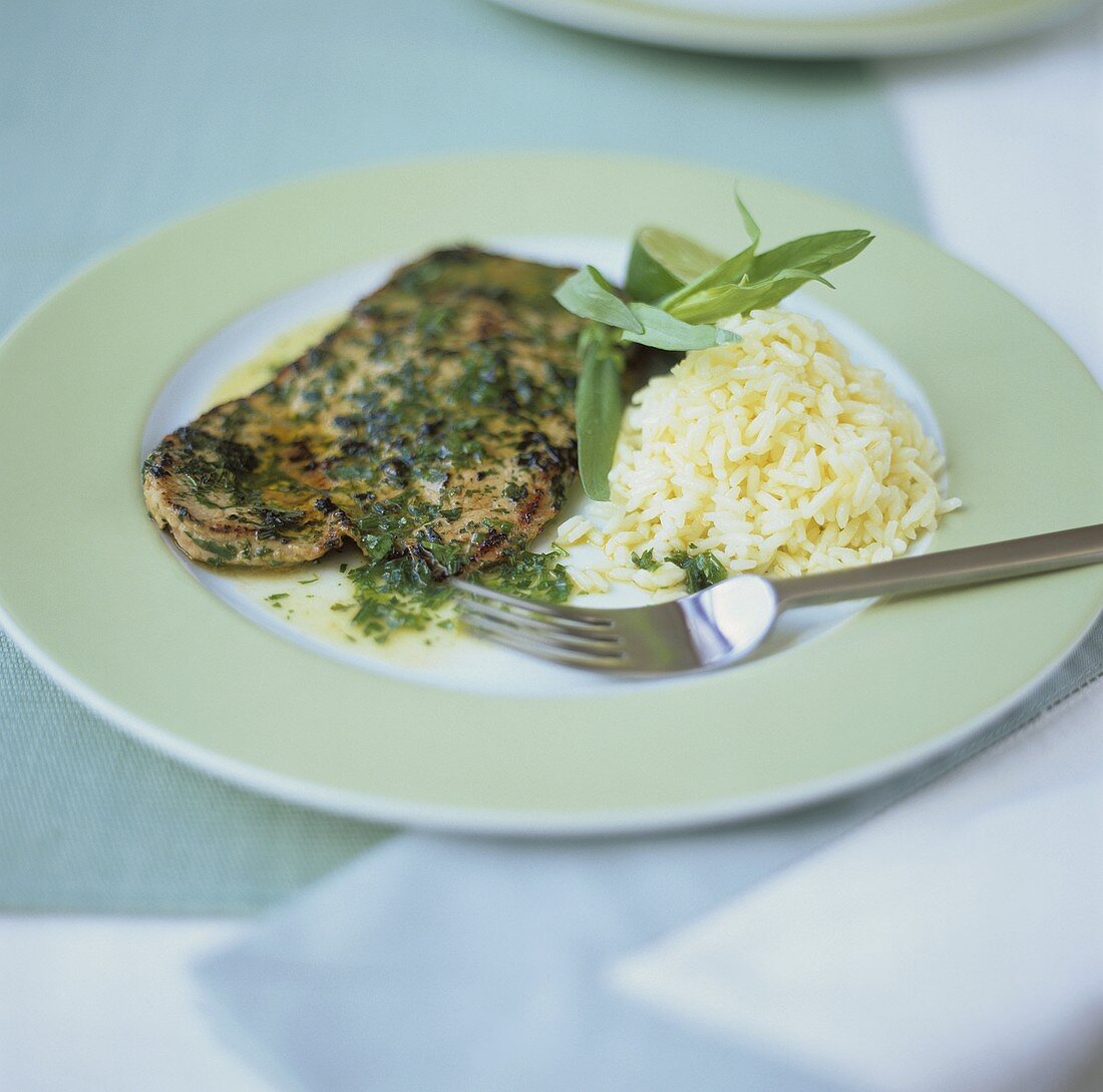 Veal escalope with tarragon butter and rice