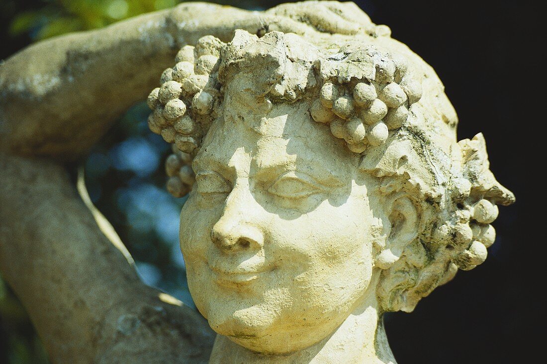 Bacchus (Roman) god of wine, stone figure