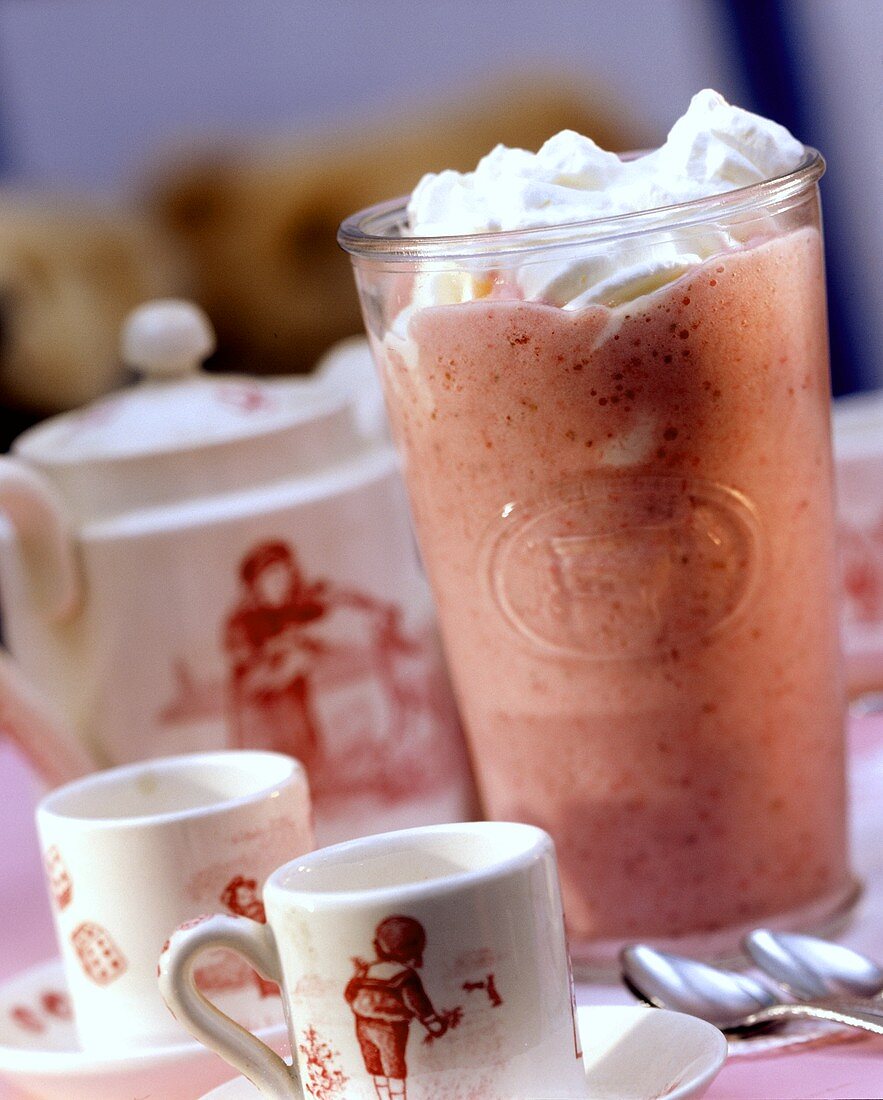 Strawberry milk shake with cream rosette