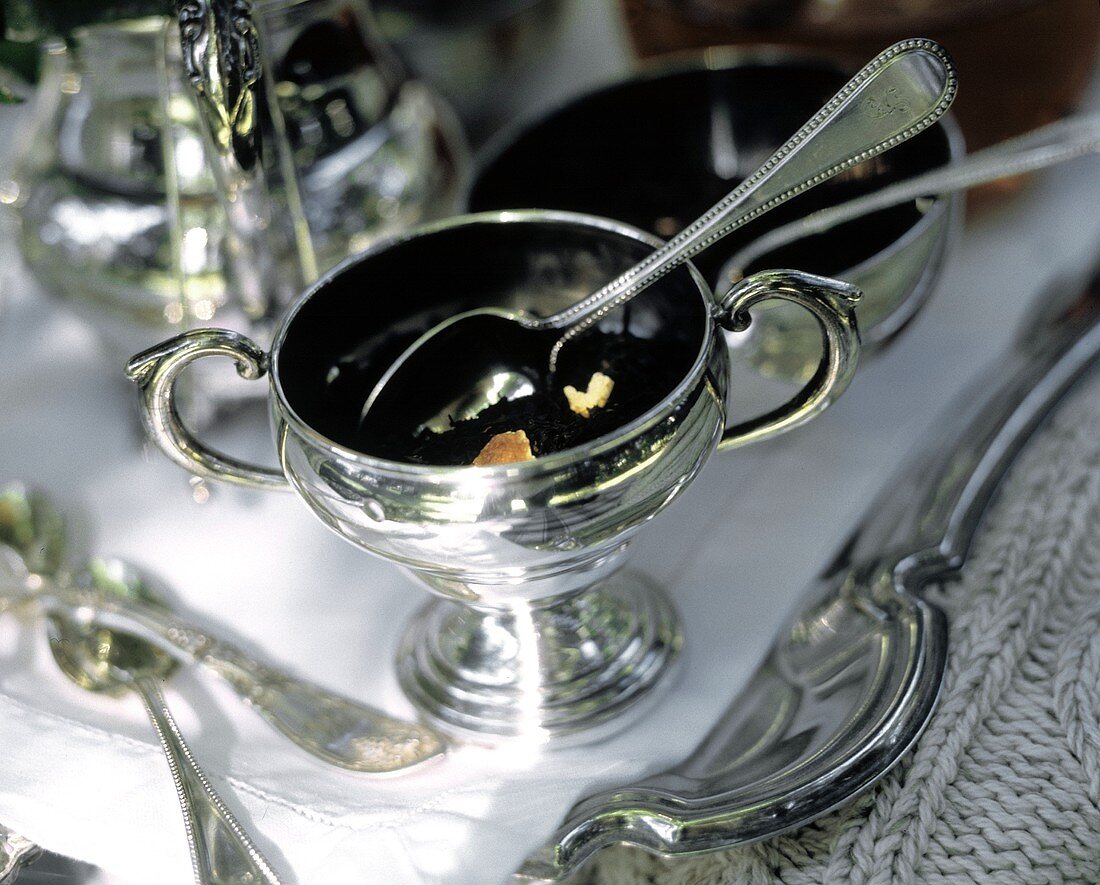 Tea Leaves in a Silver Bowl