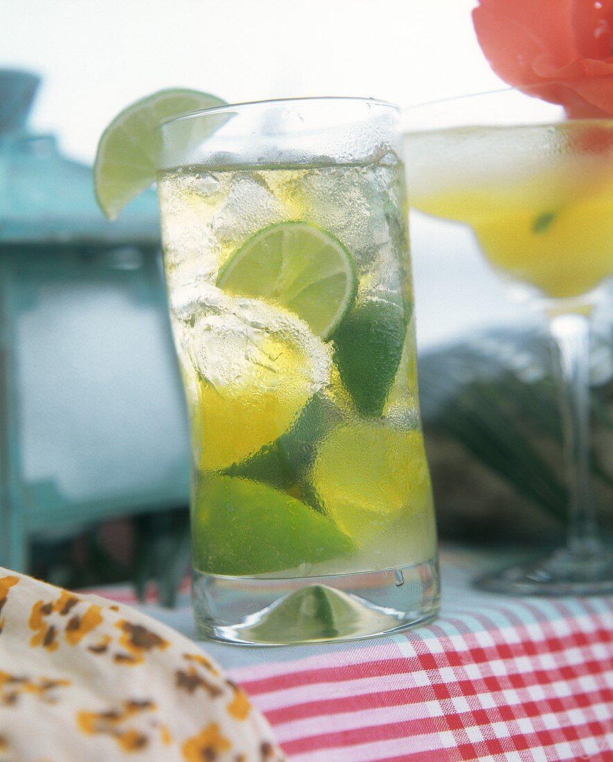 Caribbean drink with pieces of lime (Caipirinha)