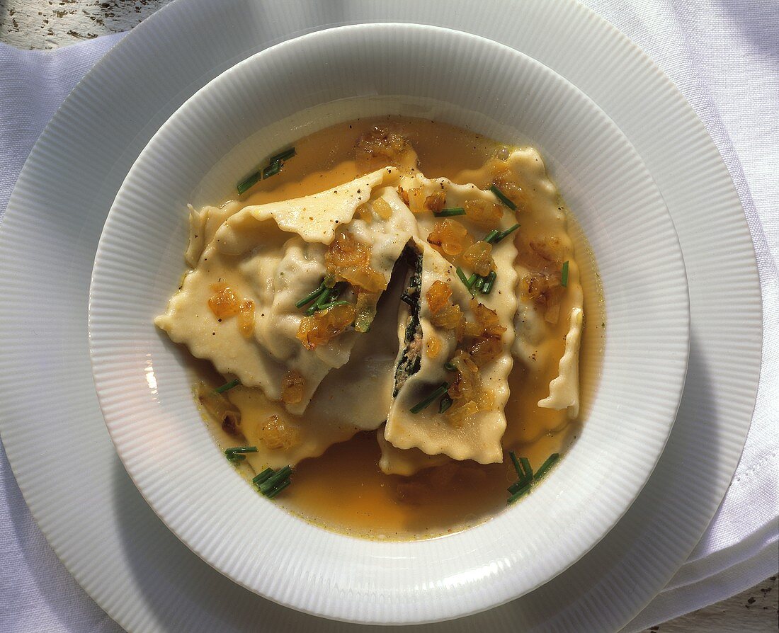 Swabian pasta parcels in broth with roast onions