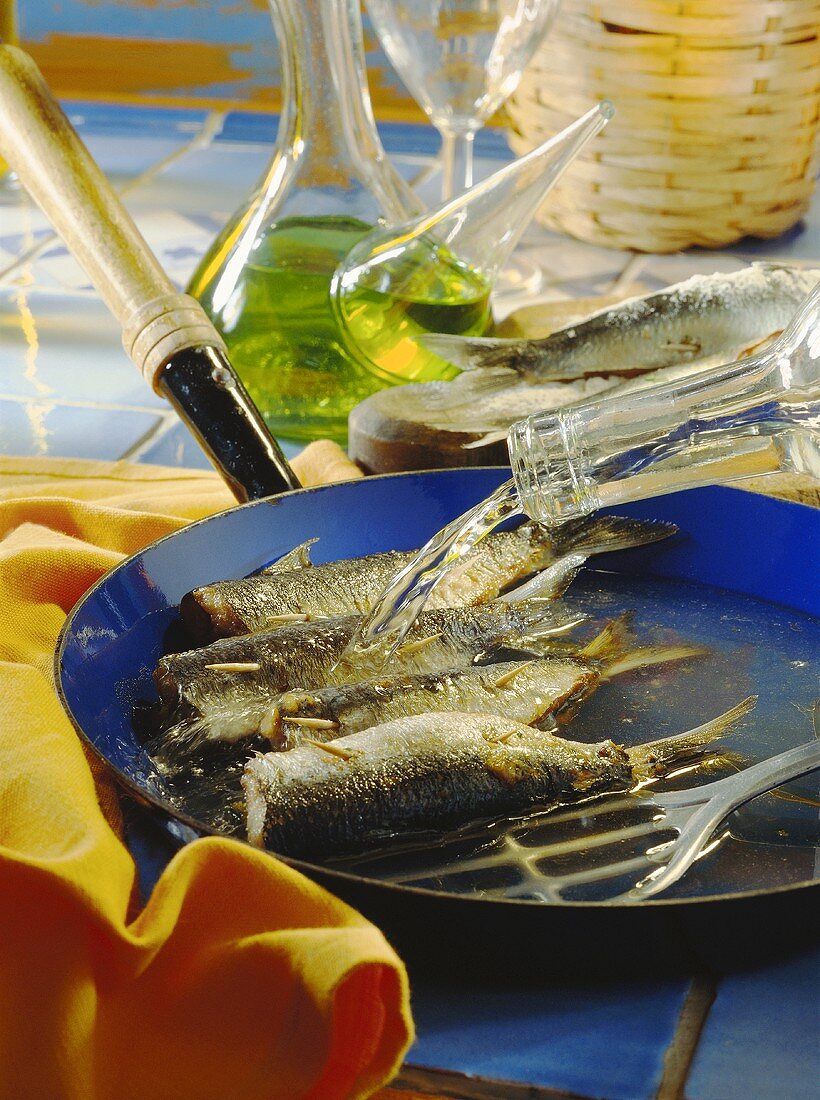 Stuffed sardines in the pan with wine