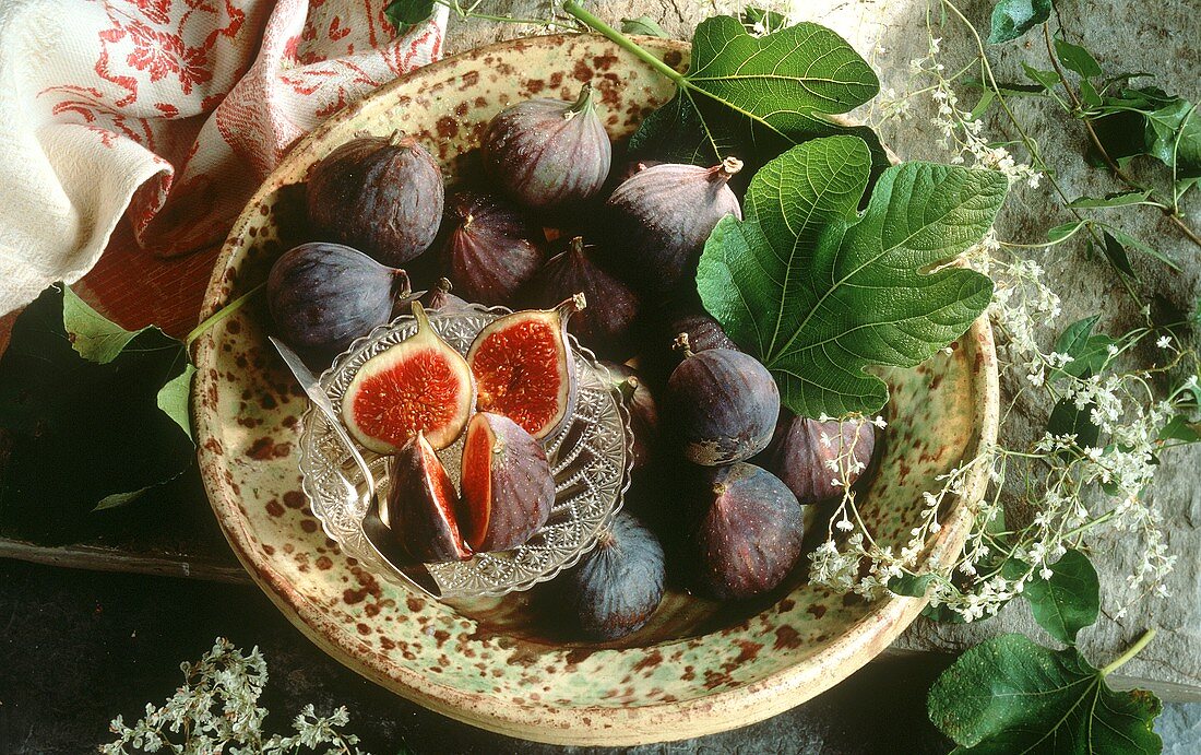 A Bowl of Fresh Figs with Halved Figs