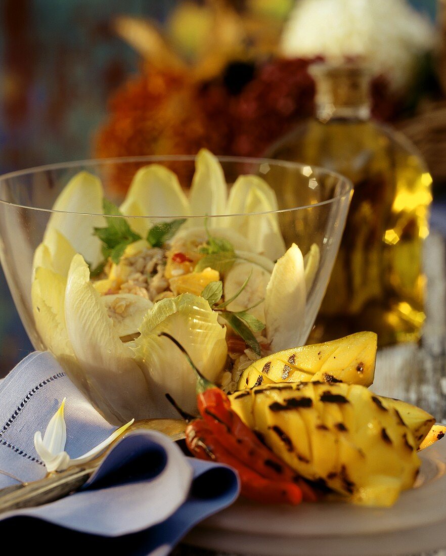 Oat salad with chicory, pineapple and mango