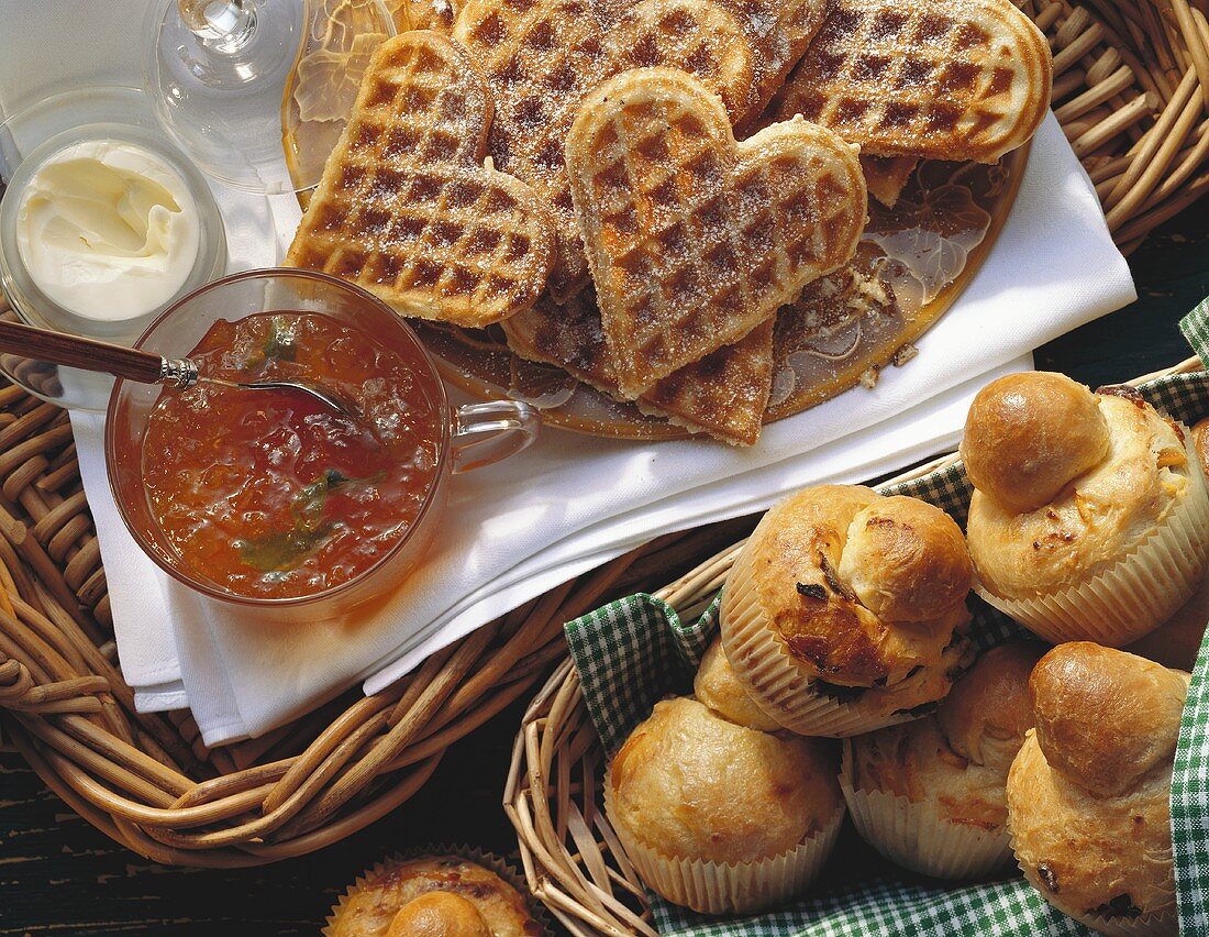 Wholemeal waffles with sour cream & marmalade; brioches