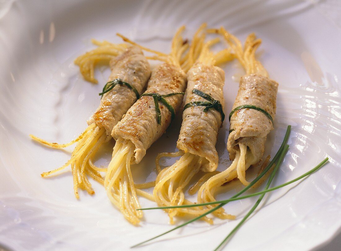 Veal roll stuffed with spaghetti