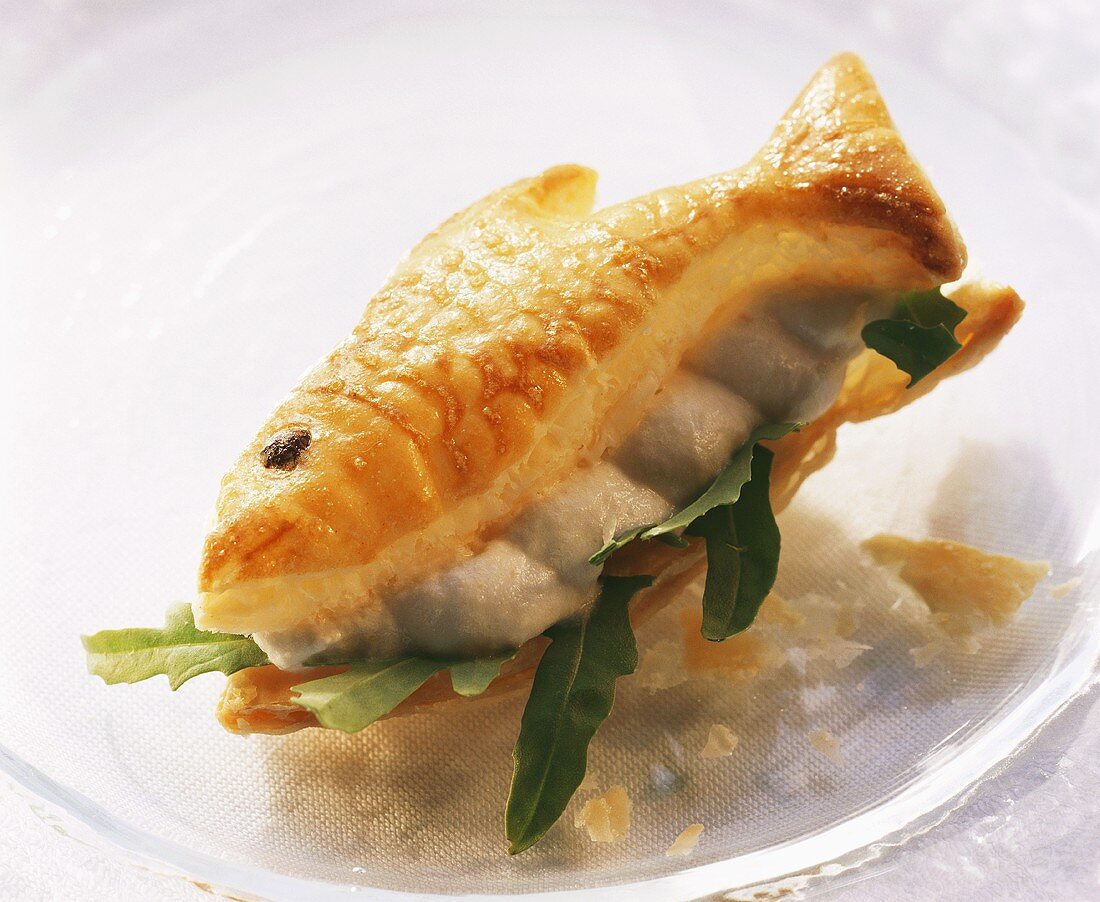 Fish-shaped puff pastry with trout mousse