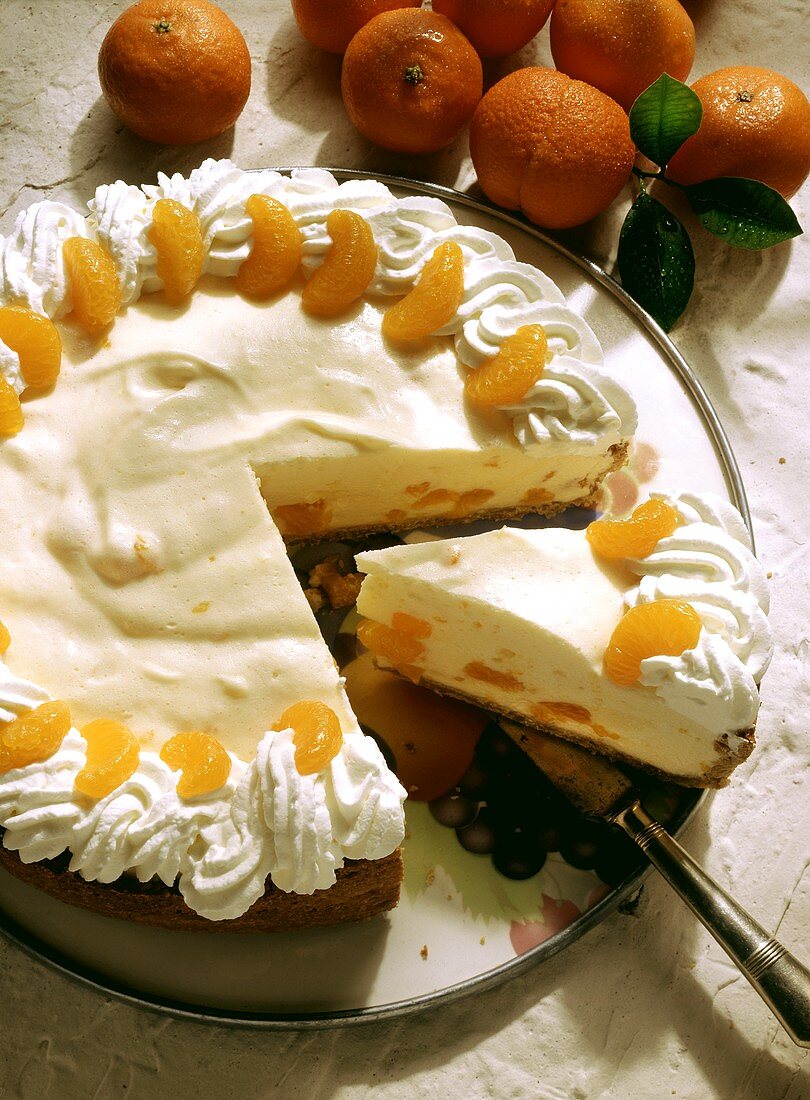 Mandarin quark cake, a piece cut