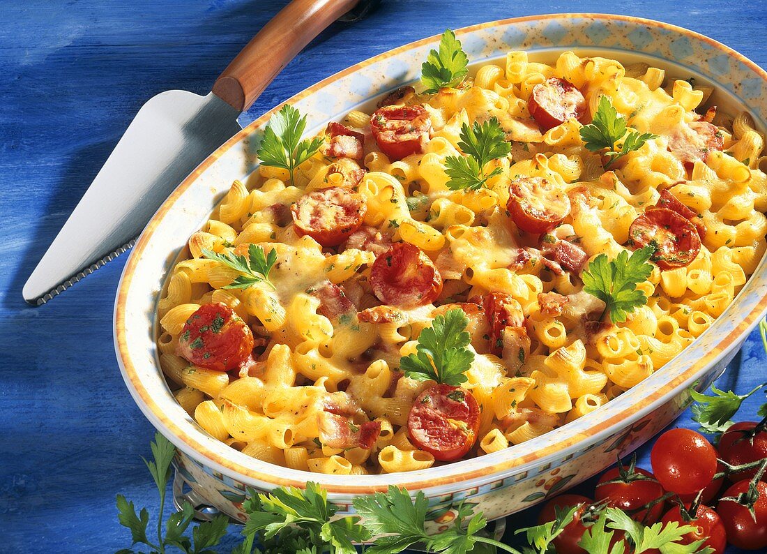 Pasta bake with crescent pasta and cherry tomatoes