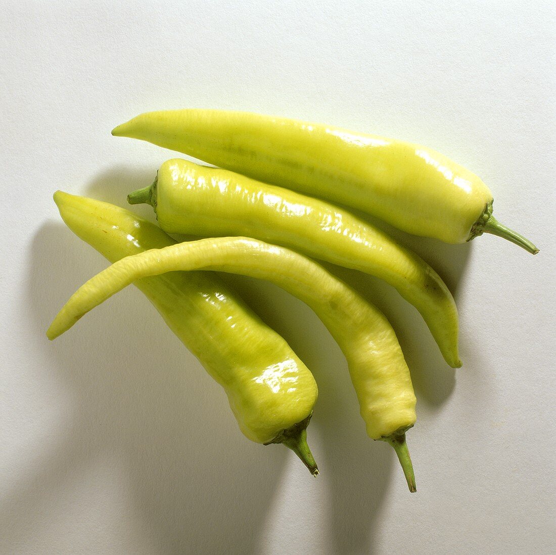 Several green chili peppers