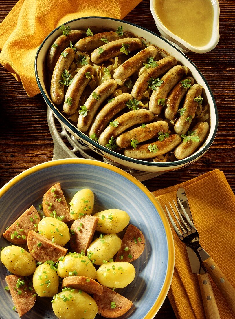 Potato gratin with sausages & sliced sausages with potatoes